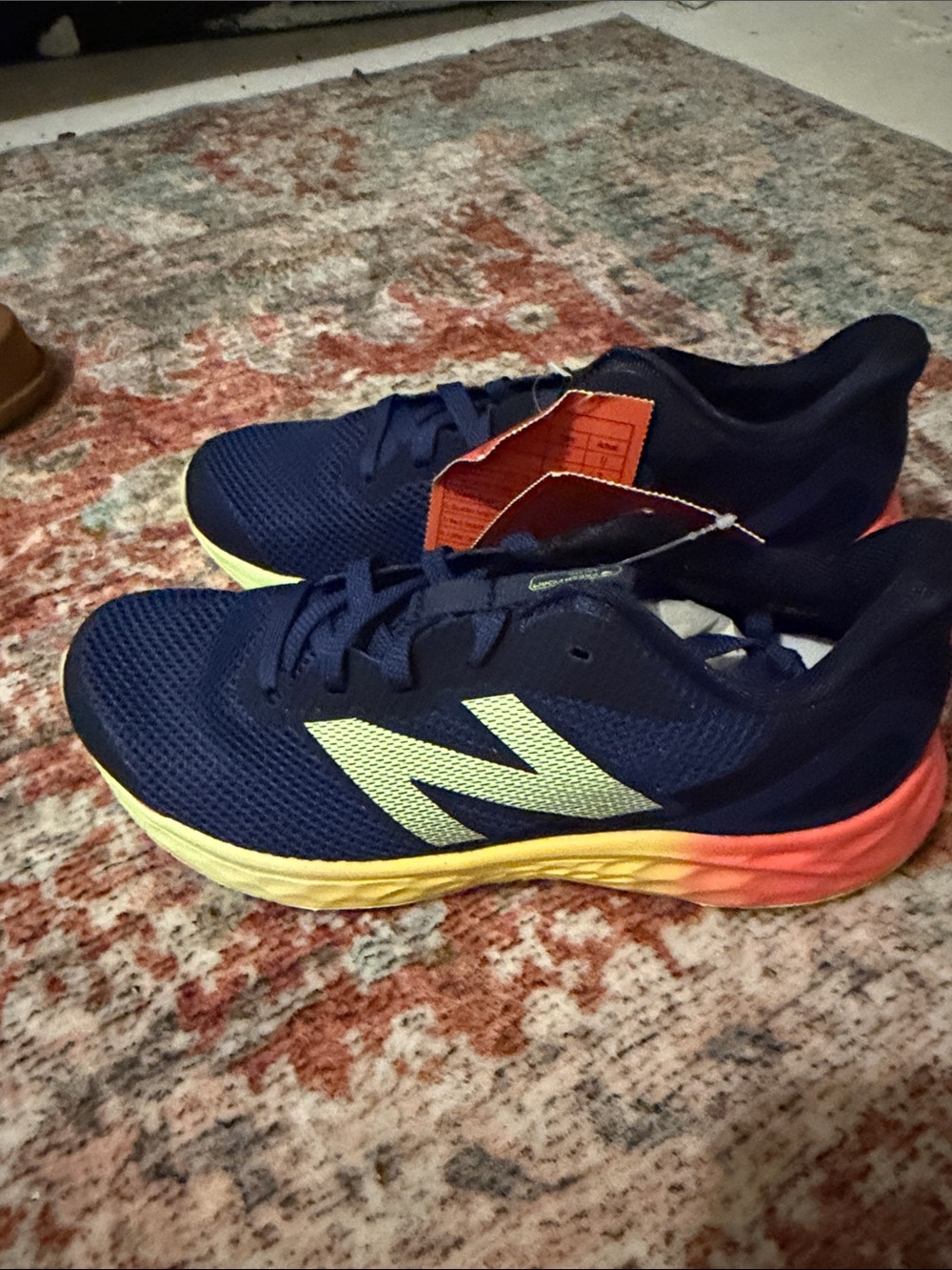 New Balance Kids Navy Sneakers with Yellow and Orange Accent